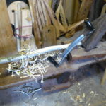 handle in shave horse with drawknife