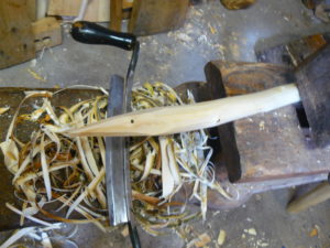 handle tip with drawknife