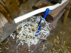 spokeshave and shavings from the handle